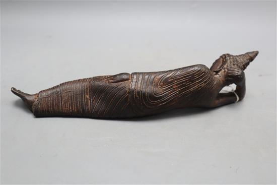 A 19th century Thai bronze reclining Buddha, length 28cm